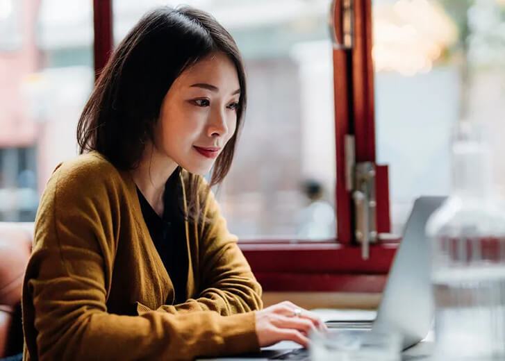 woman using laptop