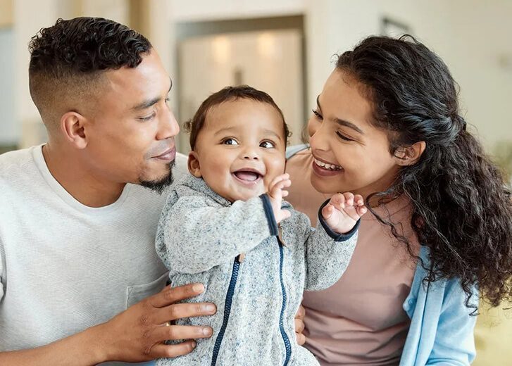 mom and dad with baby